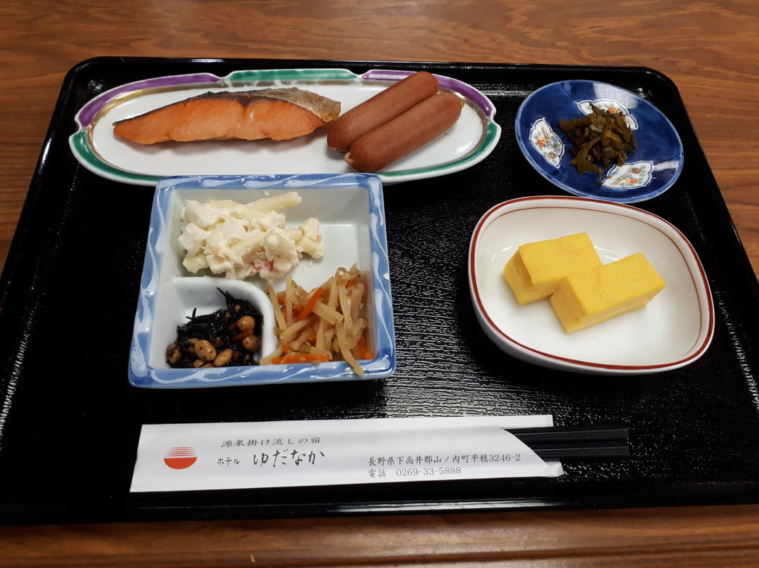 汤田中酒店主图