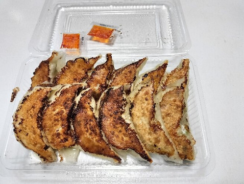 石崎ぎょうざ店主图