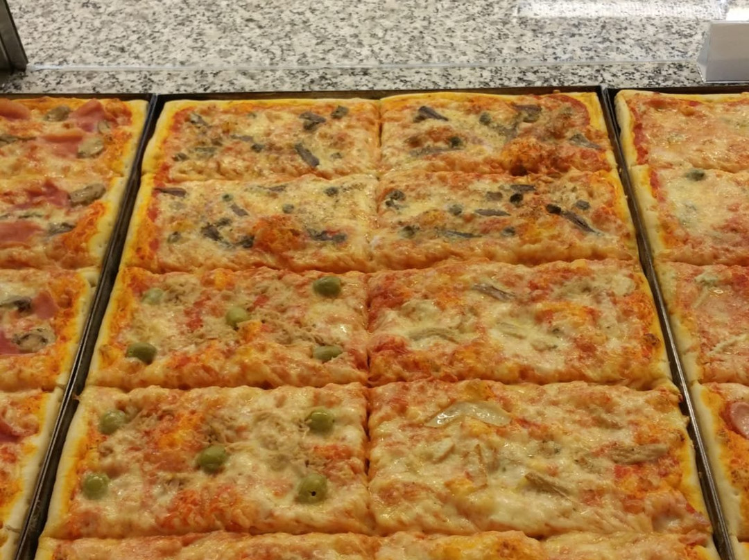 Pizzeria Paolo Taglio Pizza