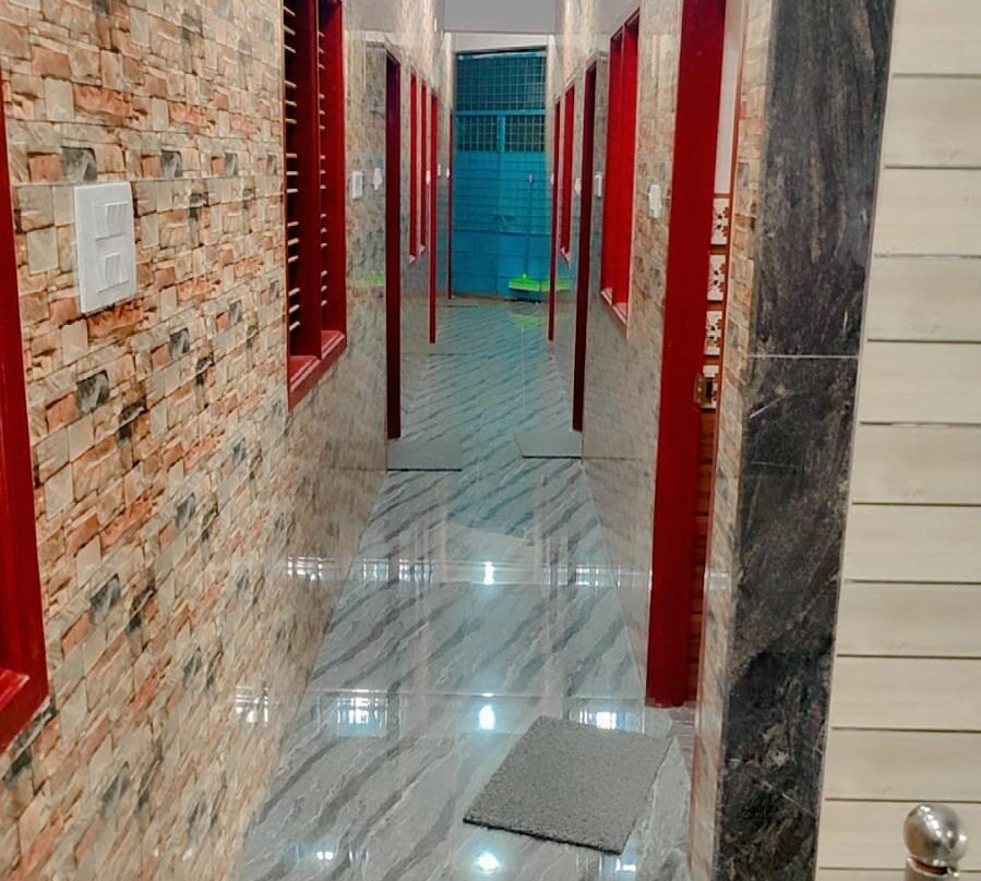 提鲁马拉舒适酒店及旅馆