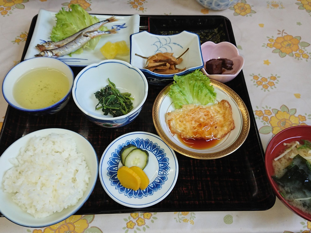 三吉屋酒店主图