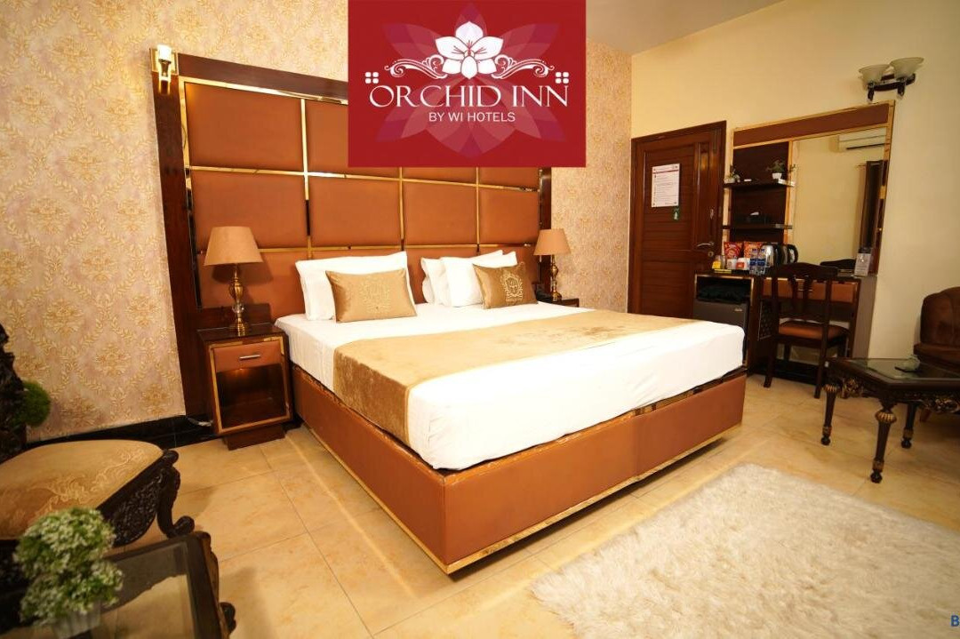 Orchid Inn By WI主图