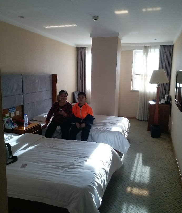 悦百客商务酒店