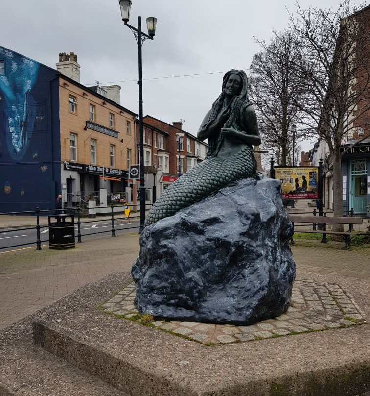 The Ebb & Flow Mermaid Statue