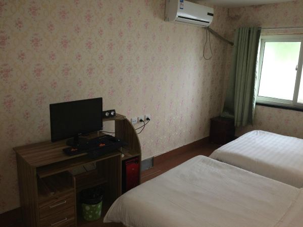 胶州宇林民宿(惠州路分店)-客卧