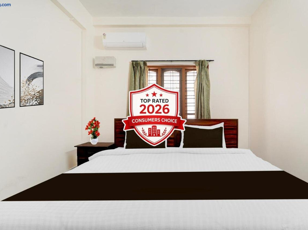 Super Hotel O Pathanamthitta Near Mahatma Gandhi Statue