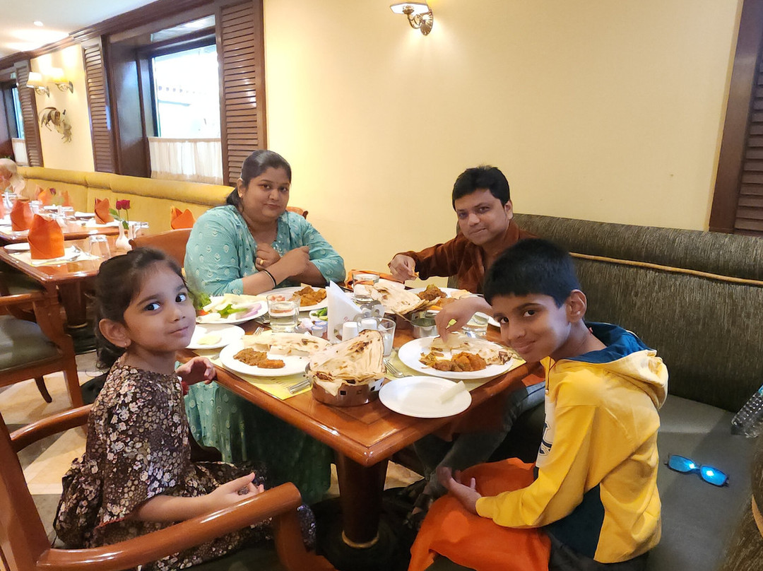 棕榈树林温德姆华美达广场酒店主图