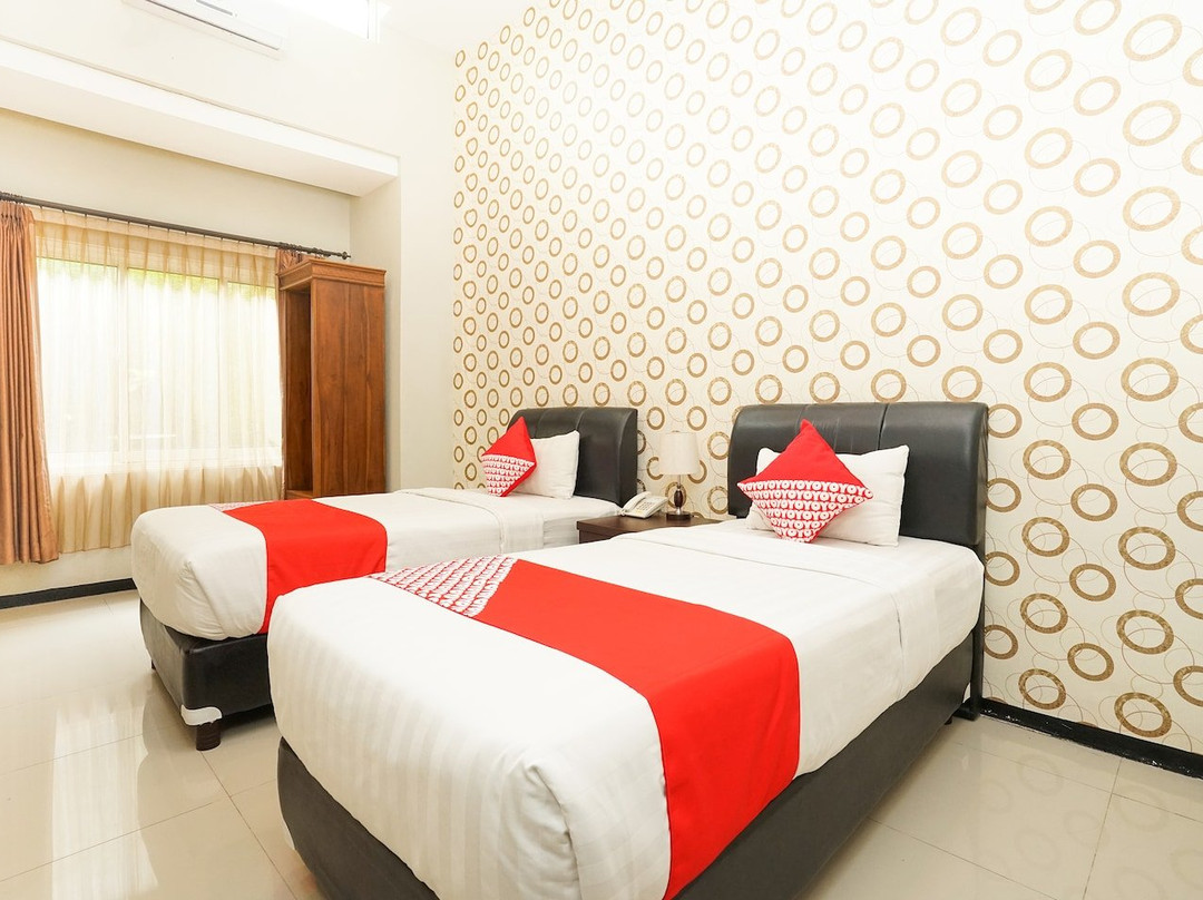 OYO 282 Putri Utari Guest House主图