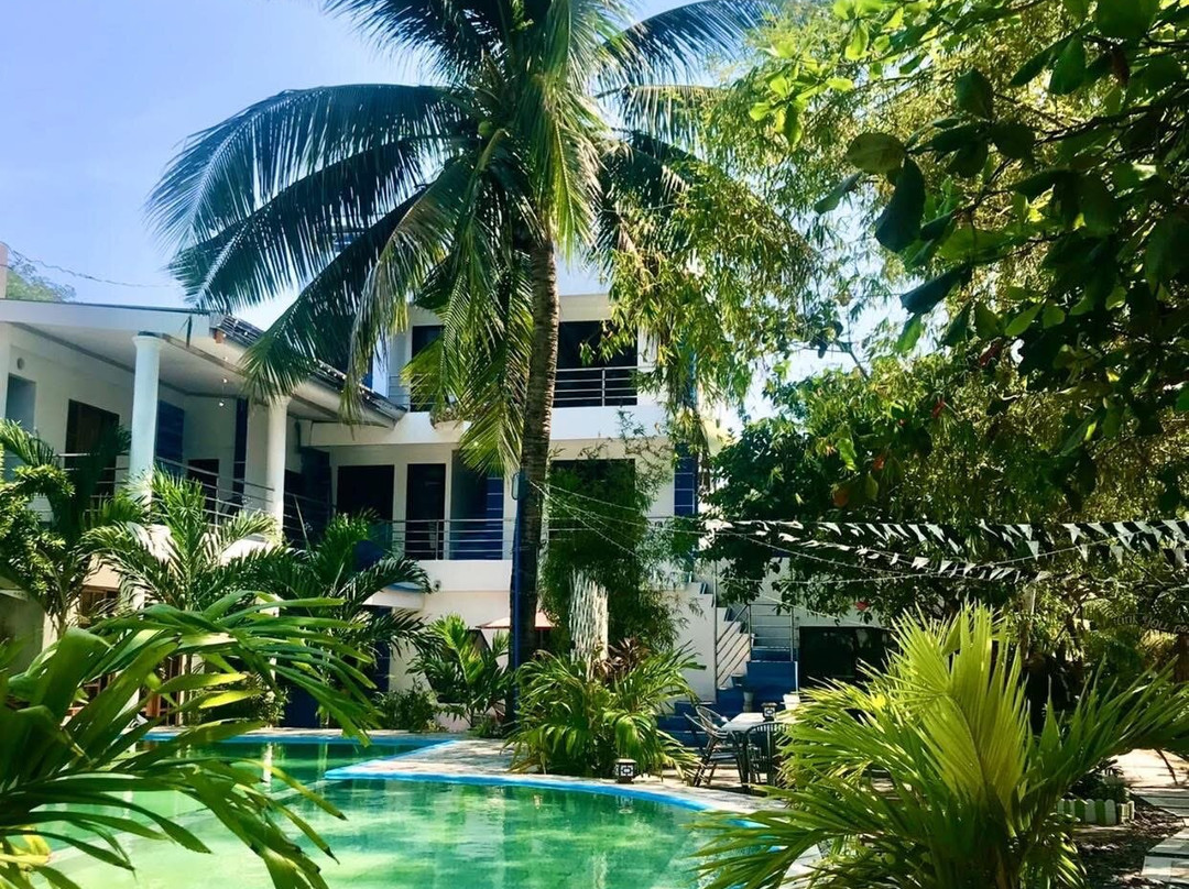 Maru's Beachfront Rooms主图