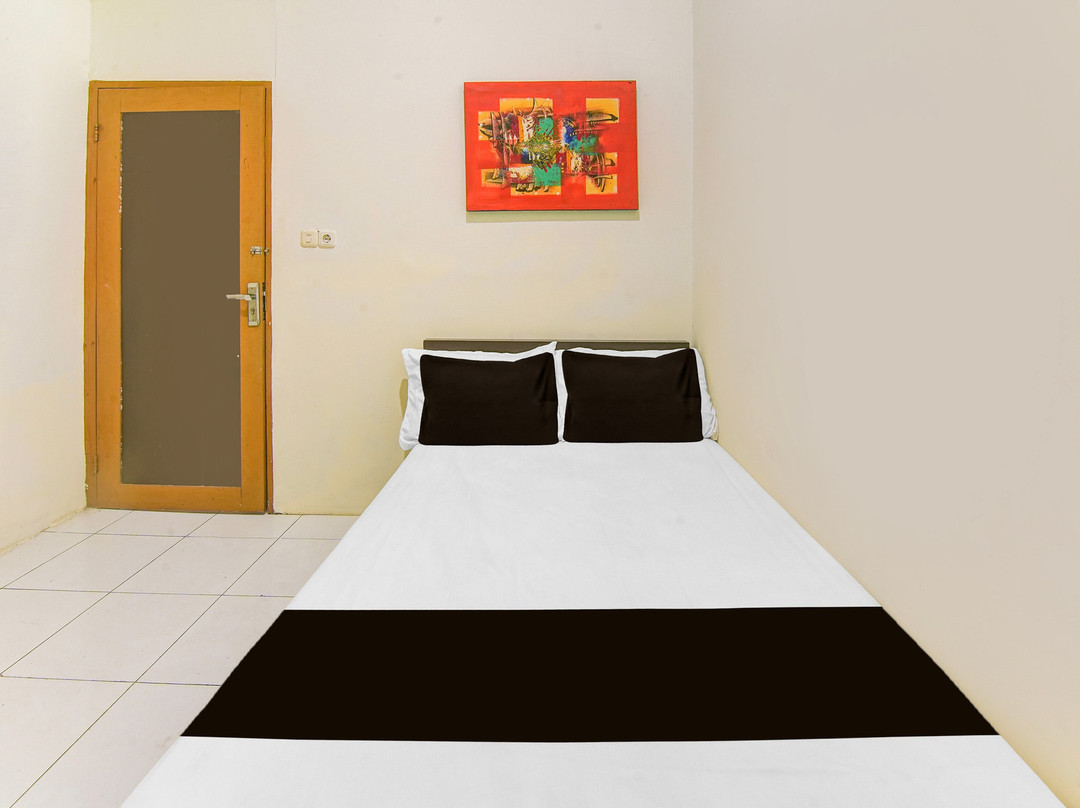 Hotel O Makassar Near RS Grestelina Formerly Wisma Makassar