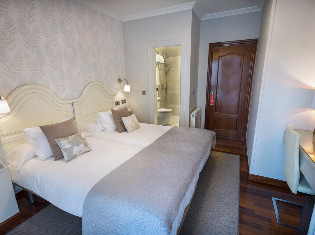 Hostal Cuatro Caminos Rooms主图