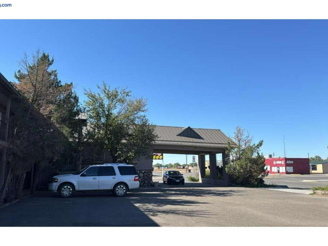 Sundowner Inn by Capital O Forsyth I 94