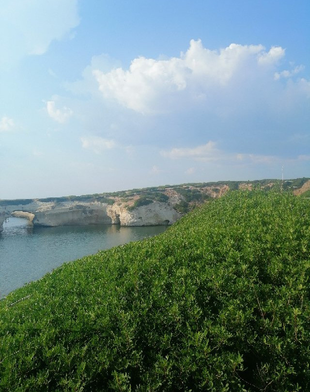 Spiaggia dell'Arco-S'Archittu必去景点