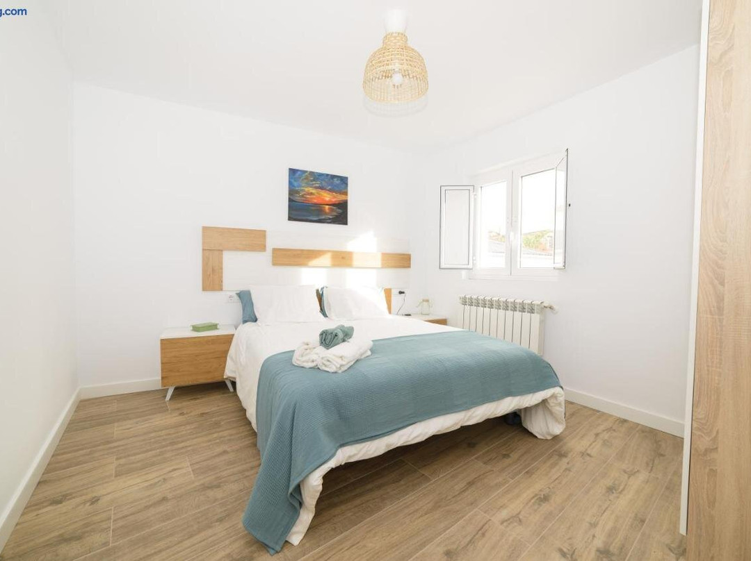 Apartamentos turisticos Praia de Seselle, terraza y jardin a un paso de la playa