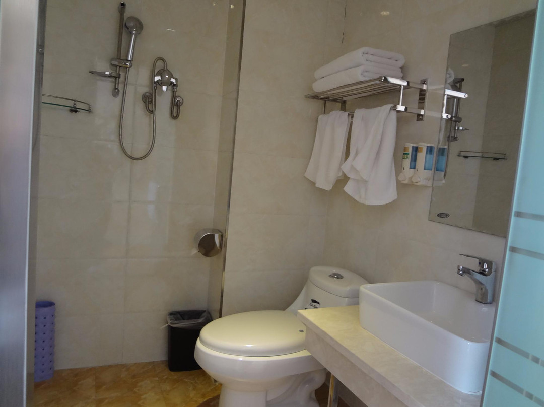 珲春梓豪宾馆一分店主图