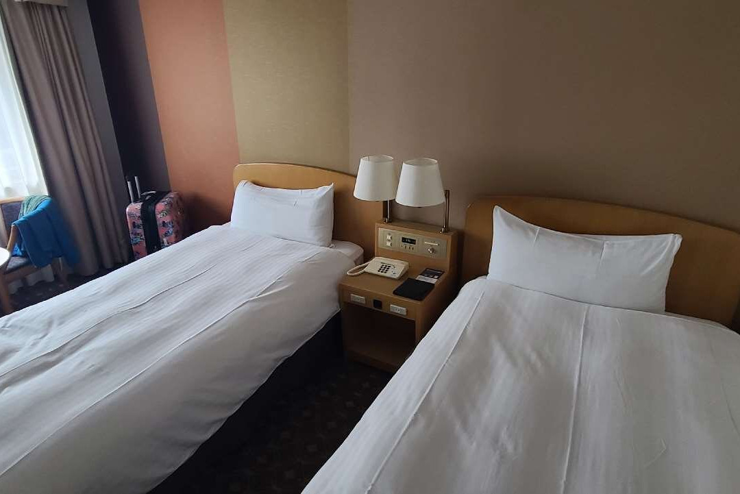 新・都酒店主图