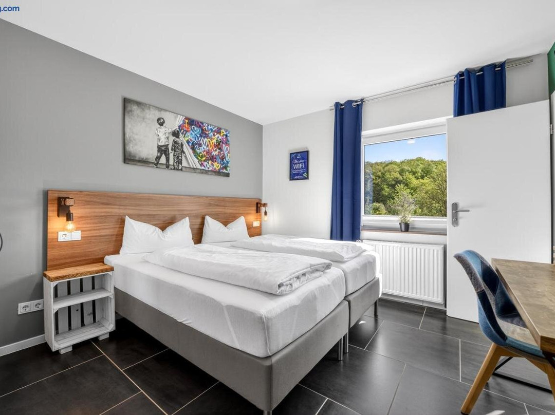 JUNIPRO Apartments & Rooms