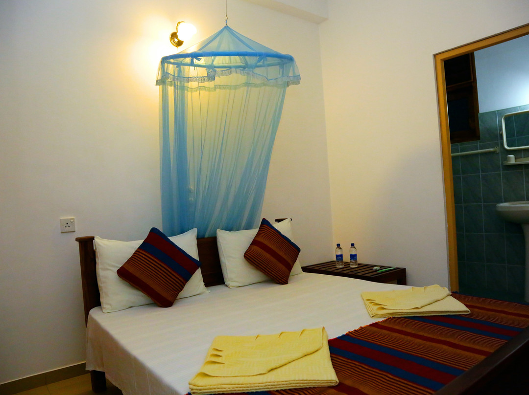 Vishmee Holiday Inn主图