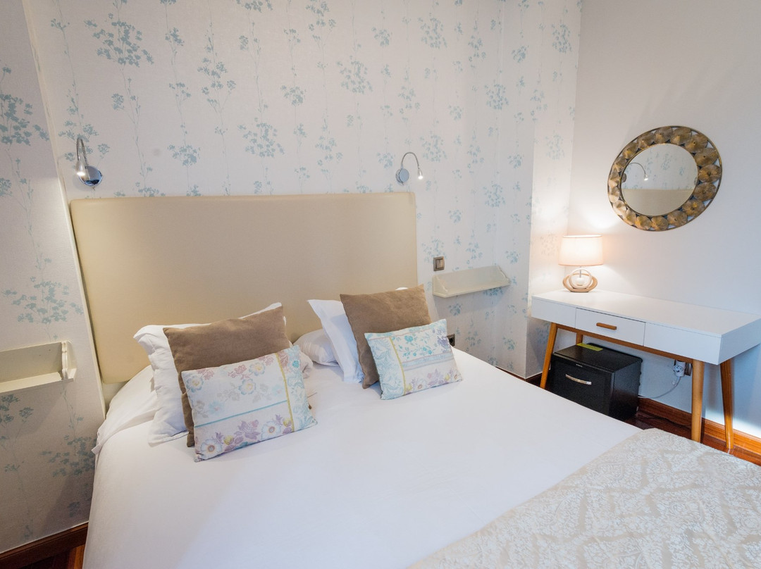 Hostal Cuatro Caminos Rooms主图
