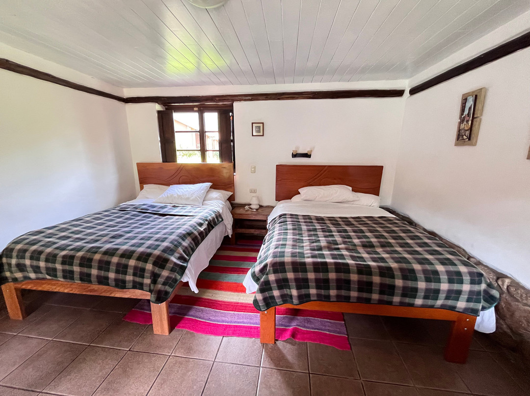 Lizzy Wasi Boutique Hotel主图