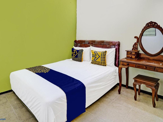 Spot On 91716 Kost Yy Syariah