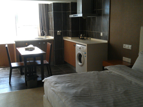 成都逗号公寓玺年店主图