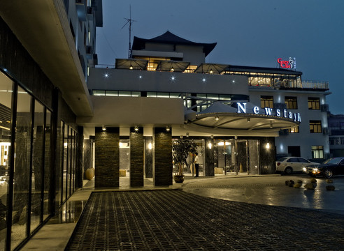 张家港新世汇酒店（沙洲路步行街曼巴特广场店）主图