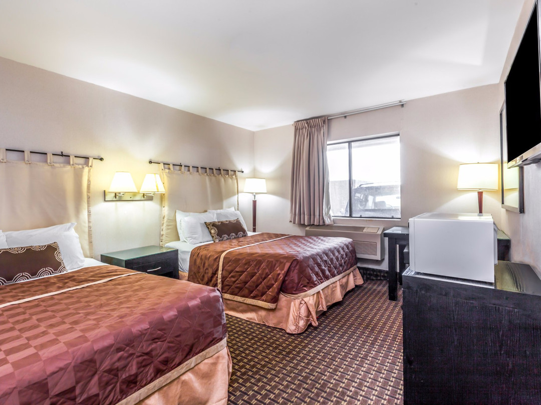 伊康洛奇套房酒店