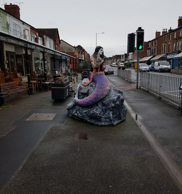 The Ebb & Flow Mermaid Statue