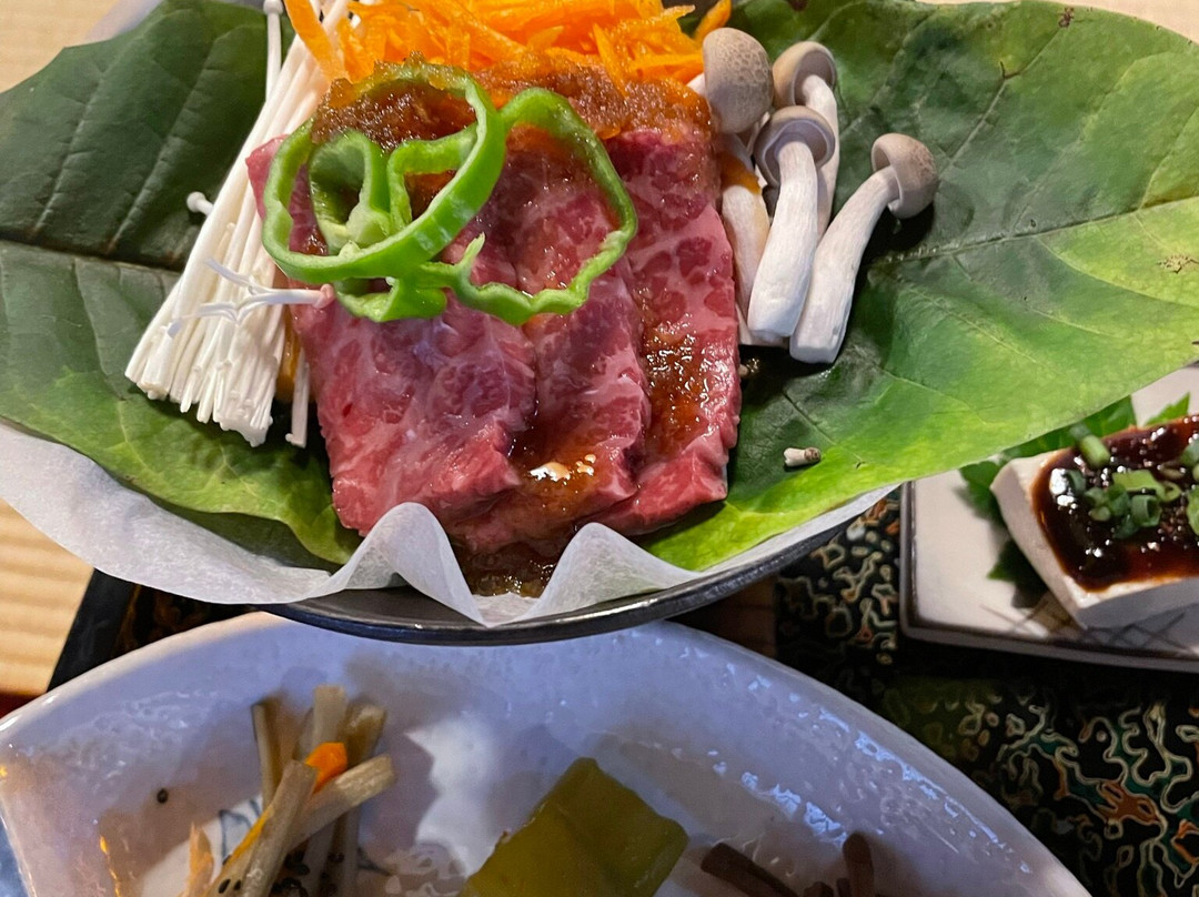 贯地谷客店主图