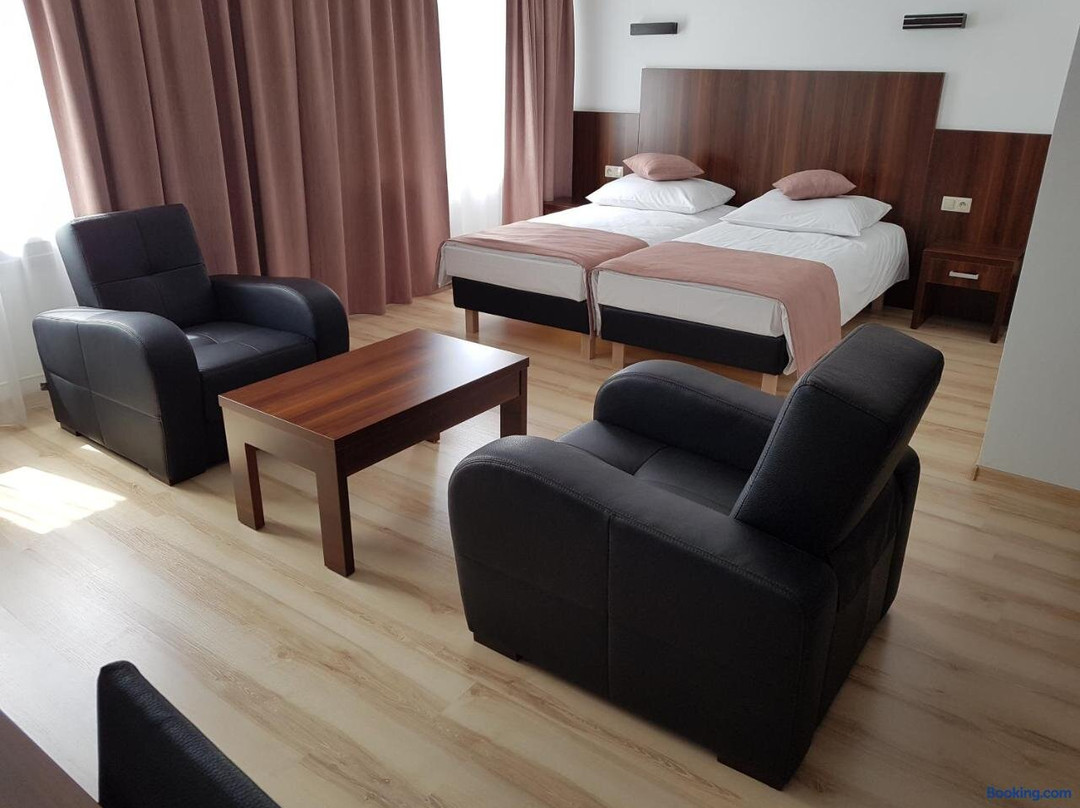 Pod Kominem - Pokoje i apartamenty