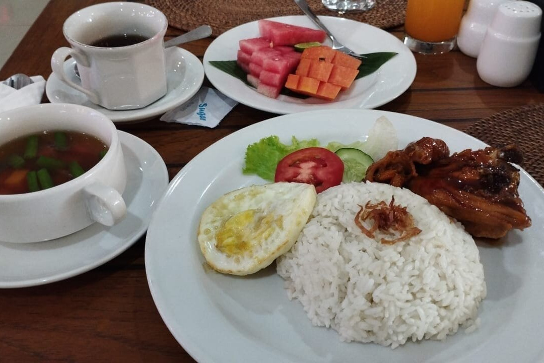 登巴萨酒店主图