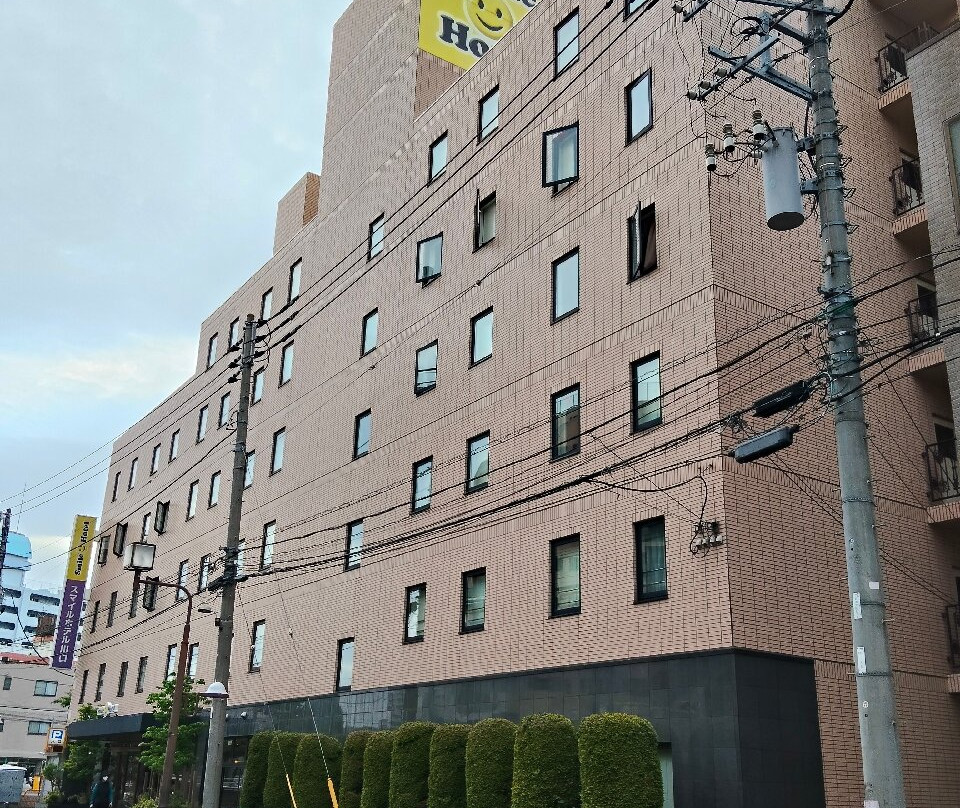 川口微笑酒店主图
