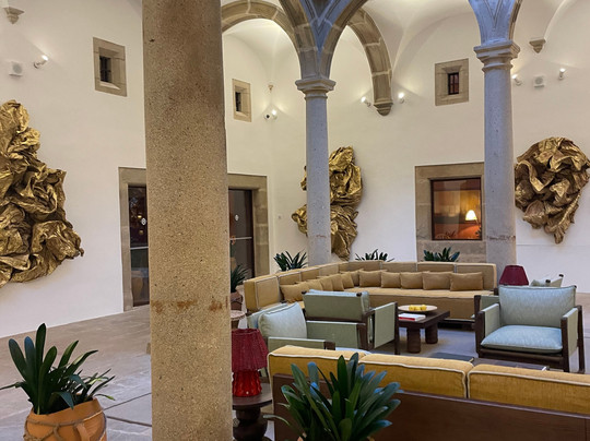 Palacio de Godoy Caceres, Curio Collection by Hilton