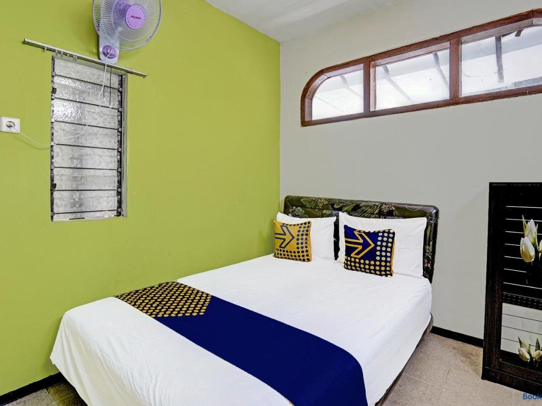 Spot On 91716 Kost Yy Syariah