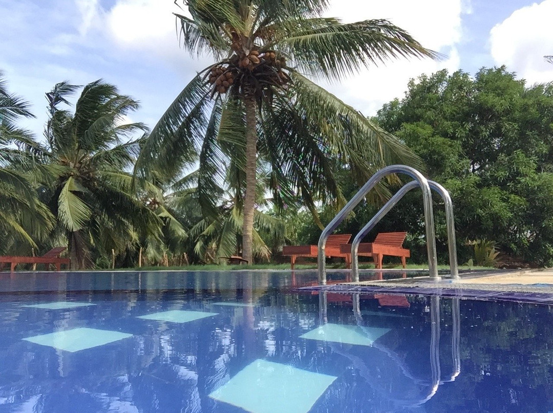 Beralihela酒店住宿-椰子花园餐厅酒店