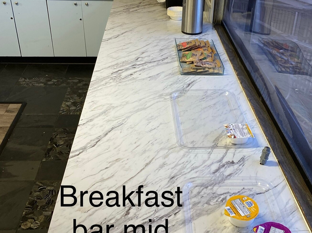 Sunnyside Inn and Suites主图