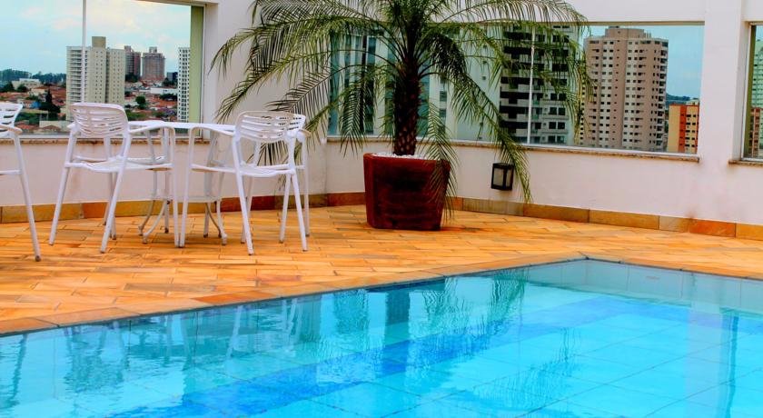 Center Flat - Hotel e Eventos-家庭/游戏区