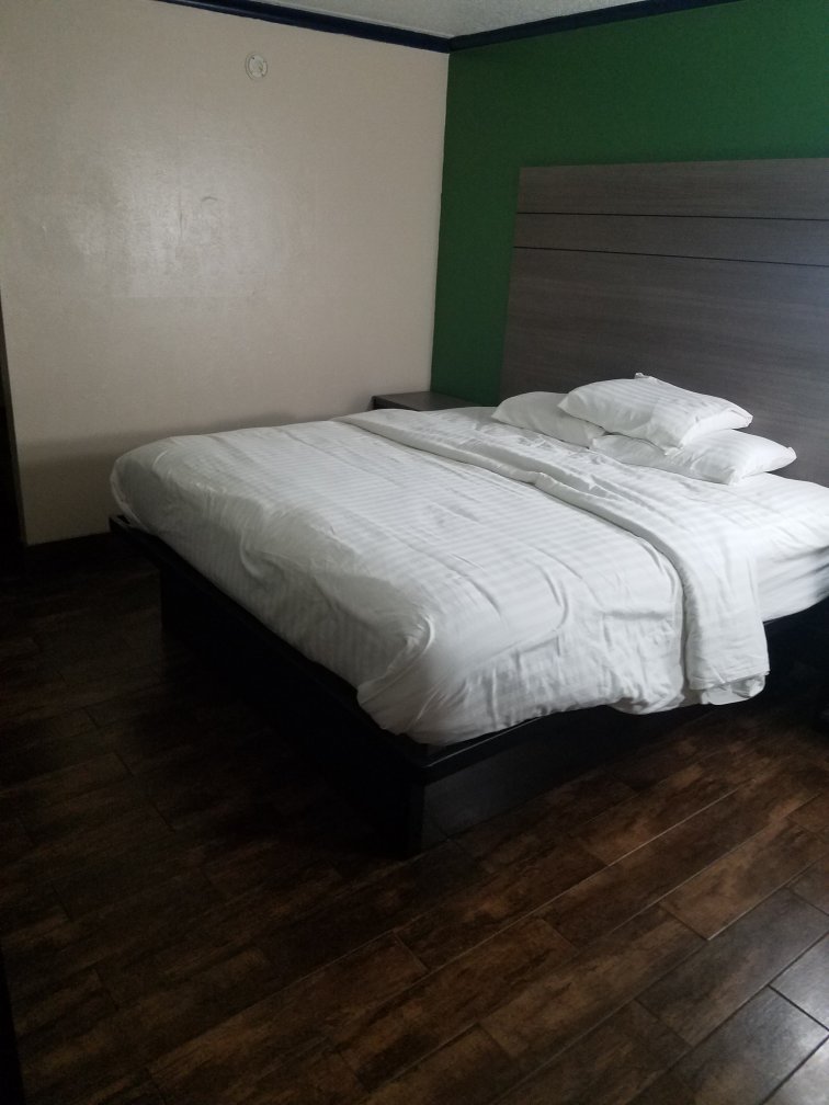 Travelers Inn & Suites-官方