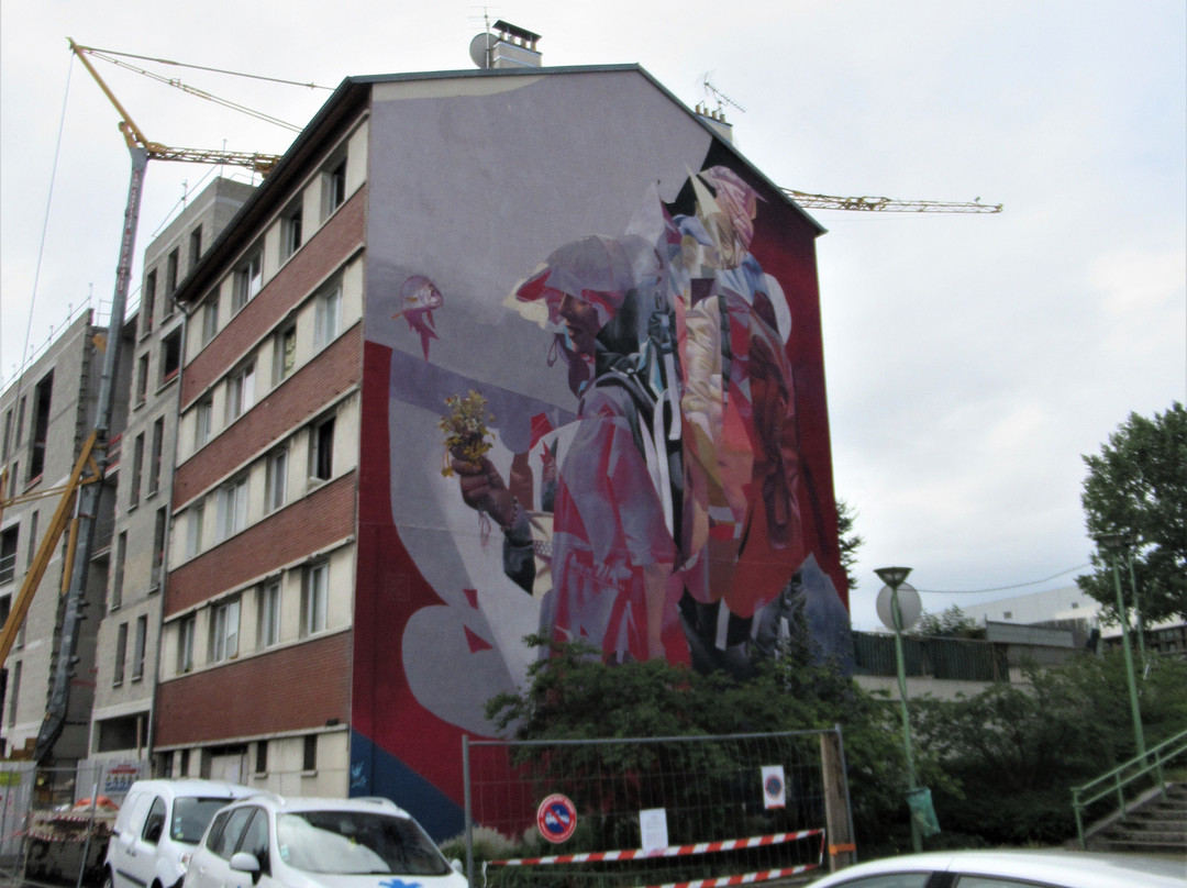 Fresque Les Migrants-塞纳-圣但尼必去景点