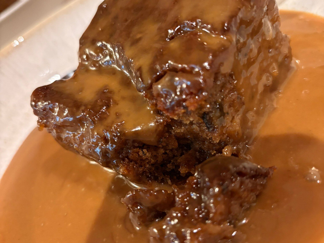 盖伊茅草村酒店主图
