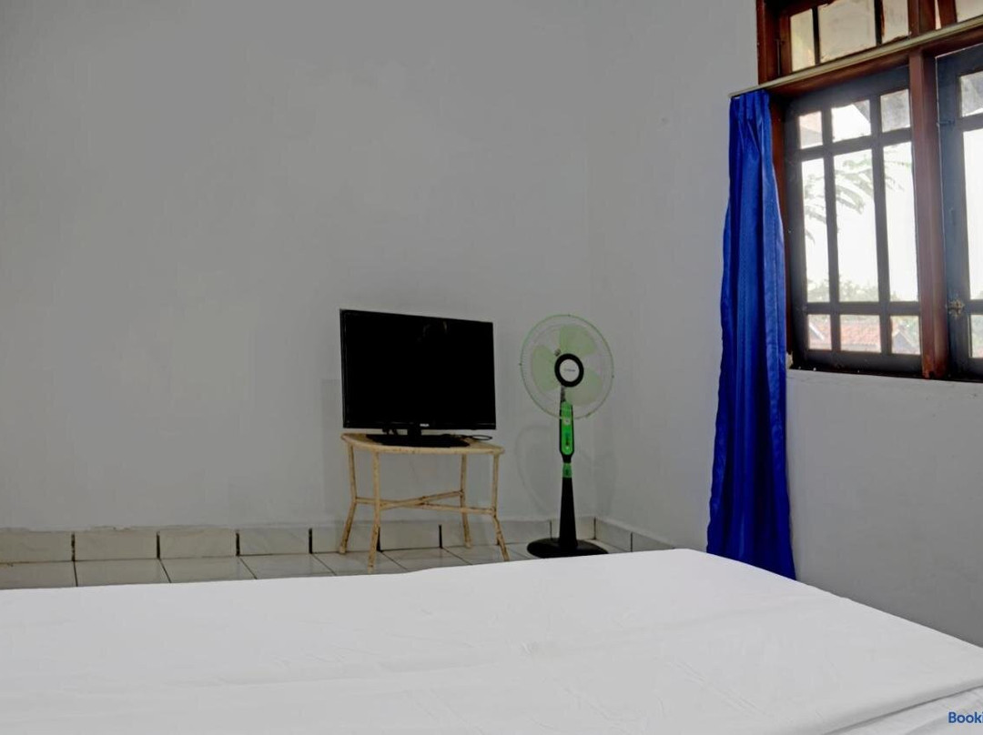 SPOT ON 92856 Home Stay Syariah Aom Kusman