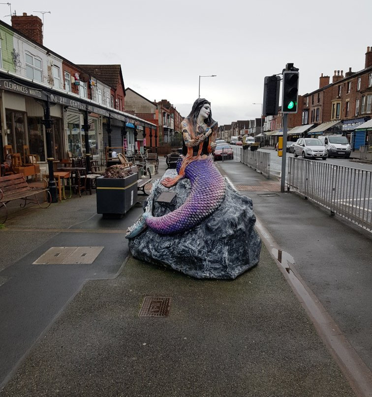 The Ebb & Flow Mermaid Statue