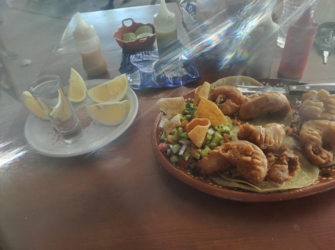 El Curandero Mariscos y Carnes