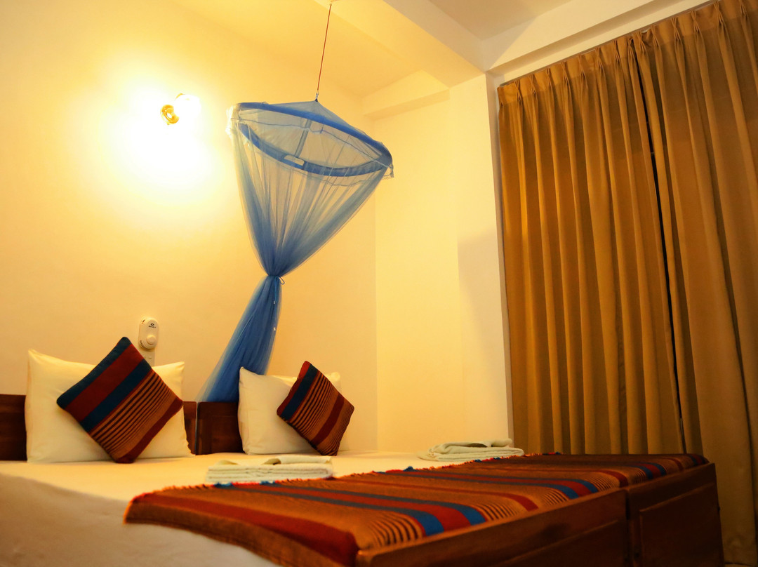 Vishmee Holiday Inn主图