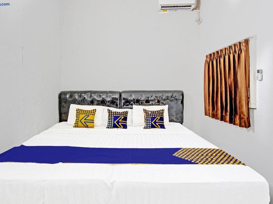 SPOT ON 91523 Kenari Guesthouse