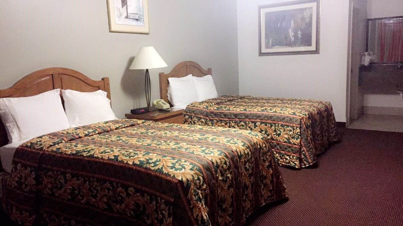 Garden Inn & Suites-官方