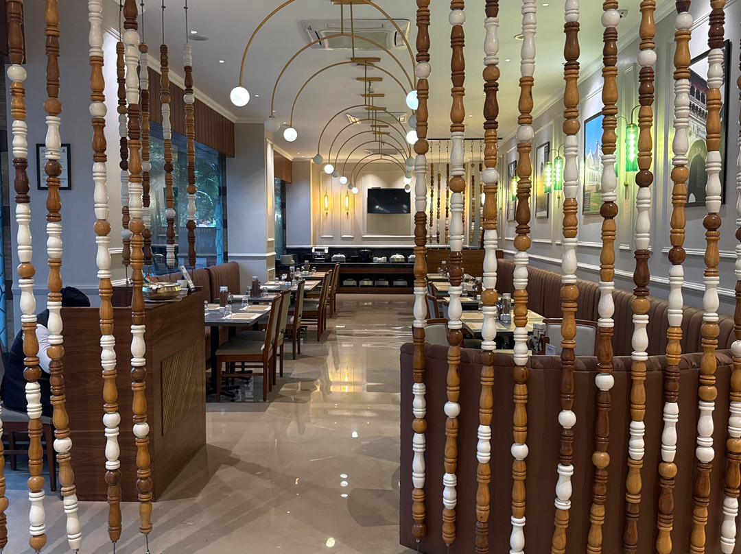 浦那维曼纳加尔7苹果酒店主图