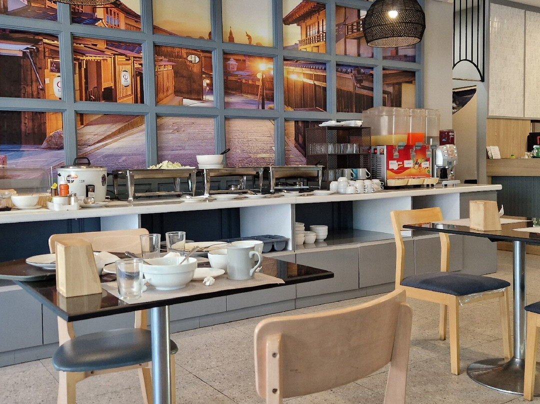 The Cozy Nest Boutique Rooms主图