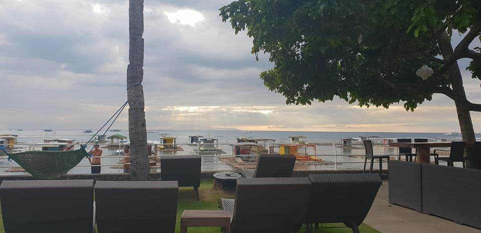 珊瑚海滩俱乐部酒店主图